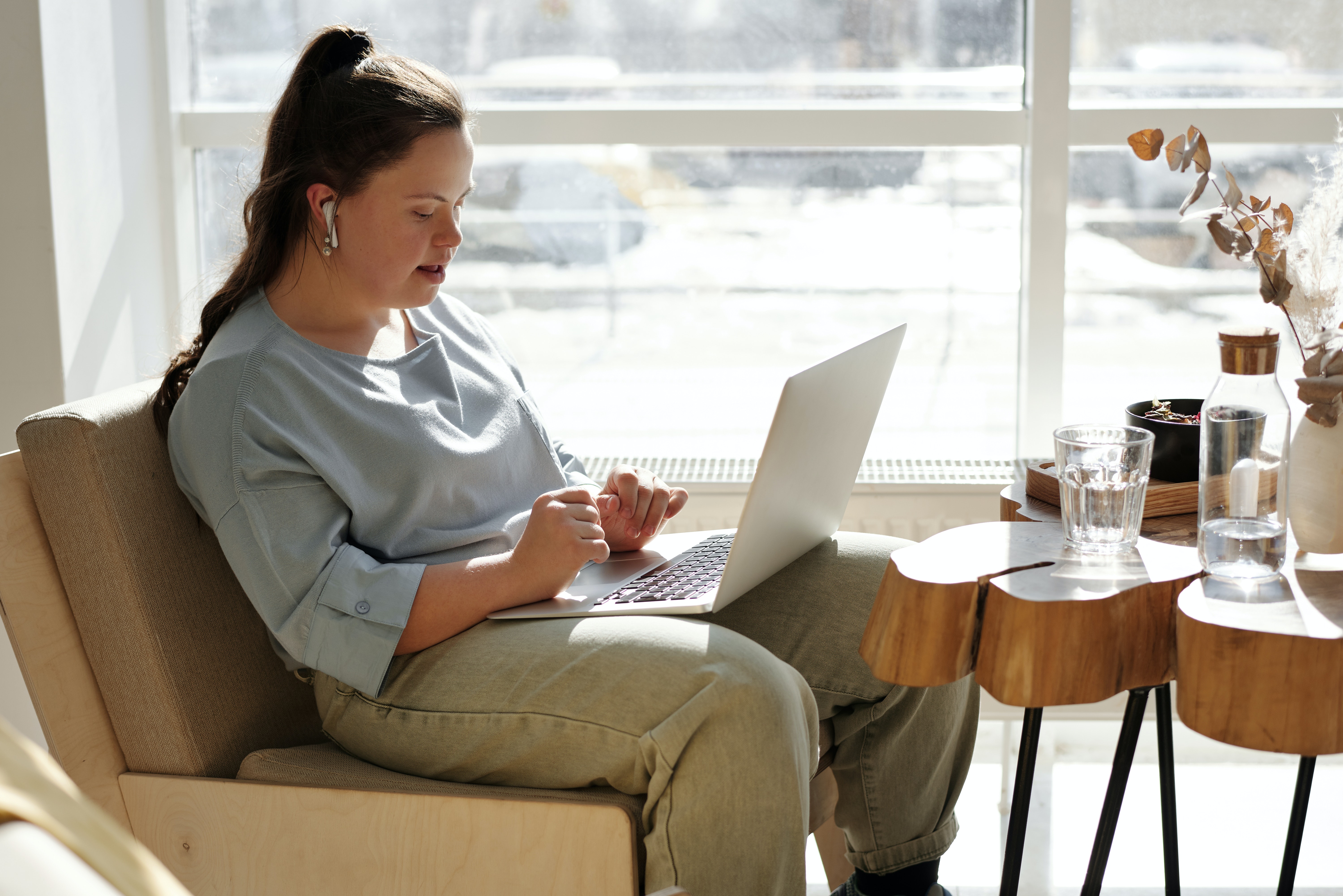 Woman sat working on laptop
